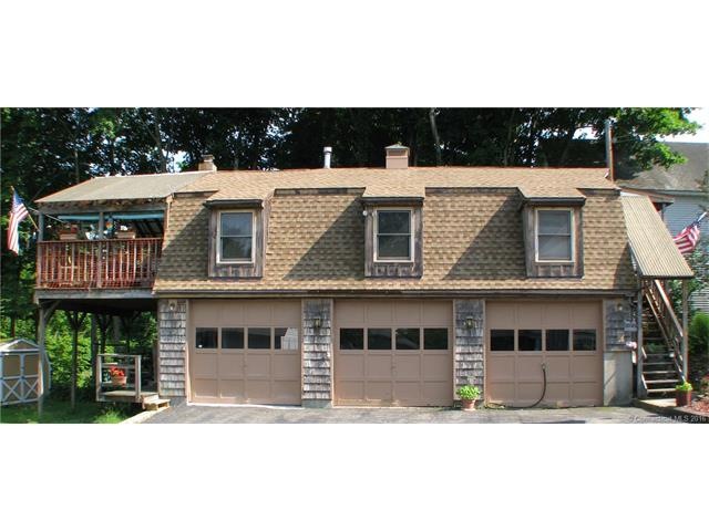 EXTERIOR NORTH SIDE - 3 CAR GARAGE - APARTMENT OVE
