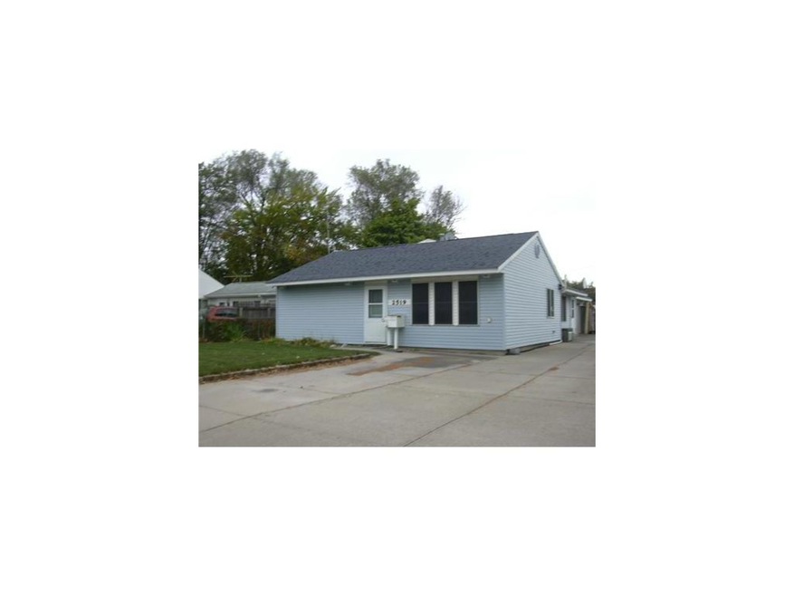 Front Exterior. front with extra parking pad