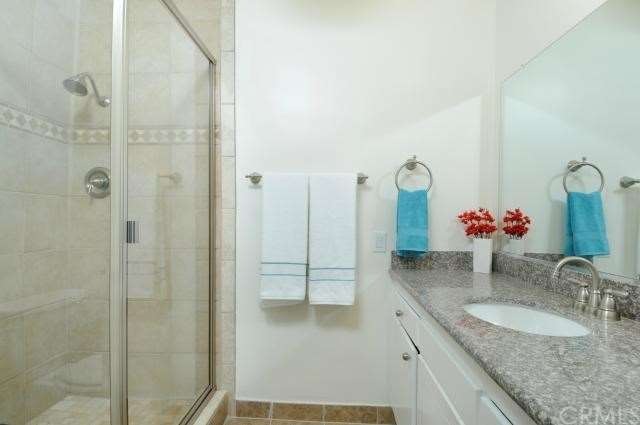Upgraded master bathroom with granite counter top 