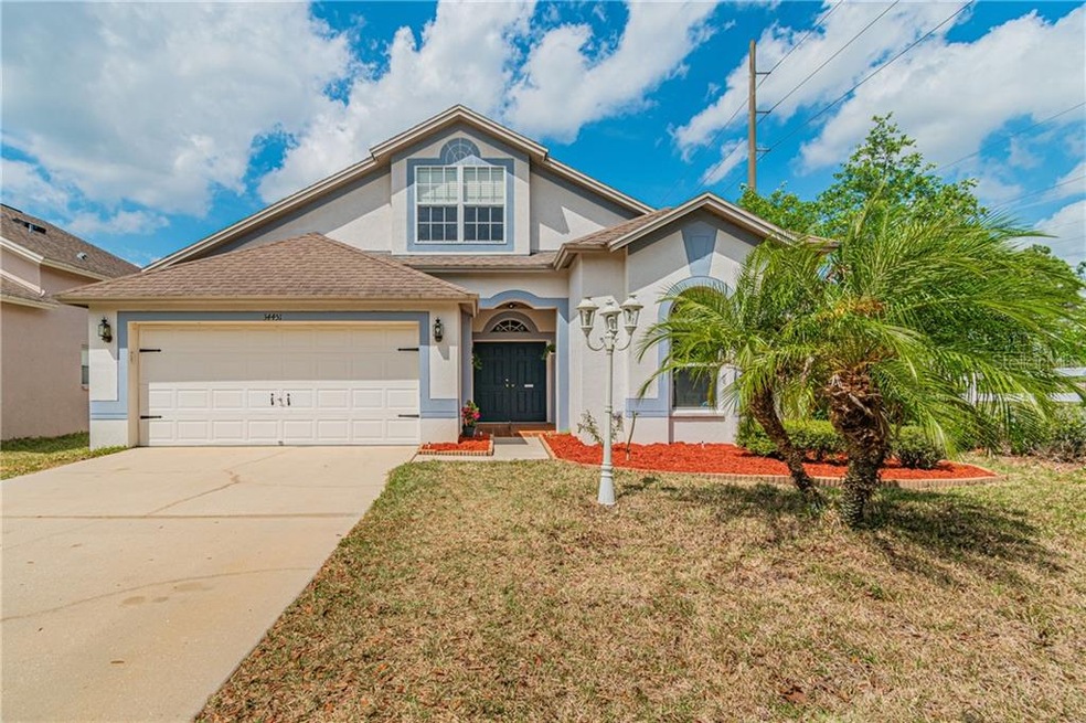 34451 Windknob Ct, Wesley Chapel, FL 33545 - photo 1