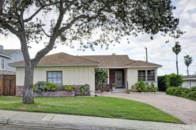 Great curb appeal in this charming traditional hom