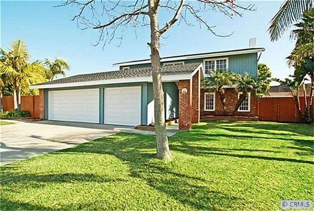 Front showing extra wide Lot with Pool on left sid