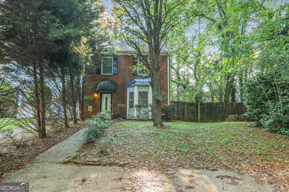 End unit townhome on a huge, fenced corner lot!