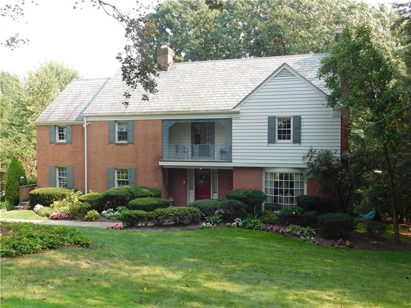 This beautiful home is nestled on a lovely lot in 