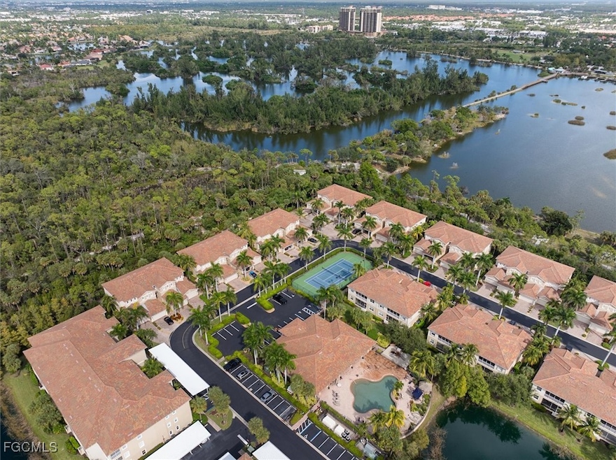 Aerial overview of property's location featuring a nearby body of water