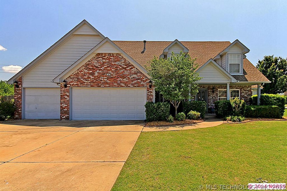 Attractive home on corner lot with attached 3 car