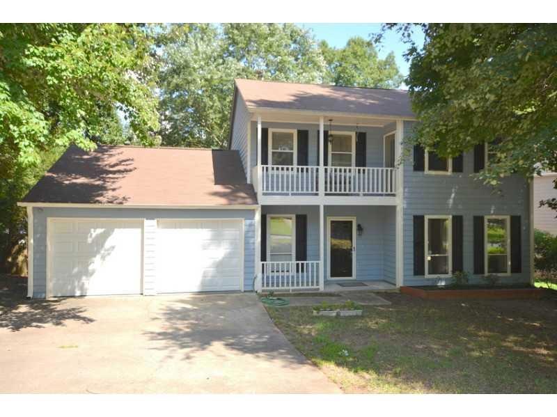 Exterior Front. Great curb appeal. Level yard. Upp
