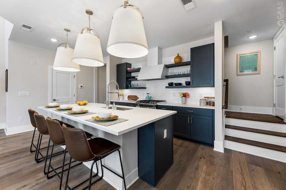 Pictures are not from actual home, finishes can vary. Open kitchen with large island