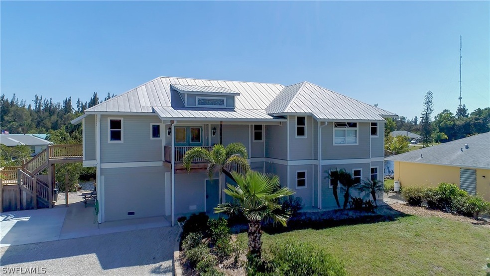 11424 Argentine Ct, Bokeelia, FL 33922 - photo 1