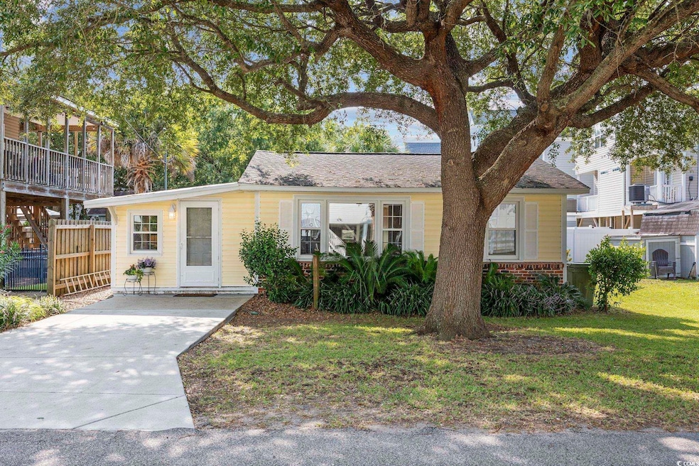 View of front of property with cooling unit and a 