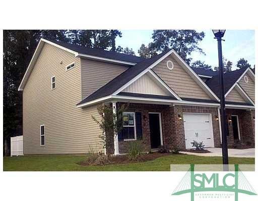 Exterior Front. Desirable End Unit