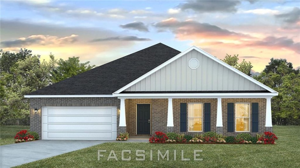 View of front facade featuring a front yard, concr