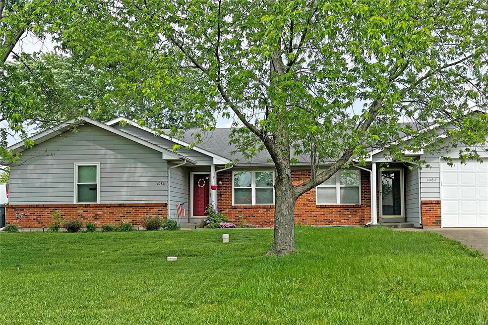 The left half of this duplex has the feel of a sin