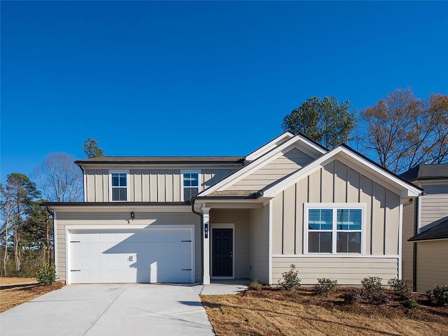 View of front of property with a garage