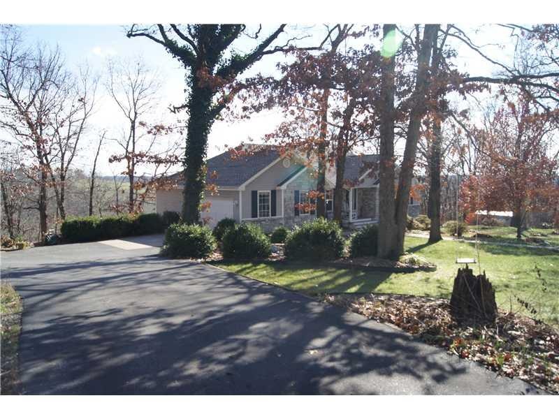 Exterior Front. Awesome landscaping on quiet street.
