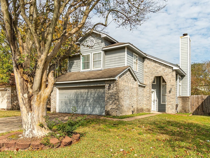 Two story home has brick and siding.  Seller says some siding is wood and some is cement board.