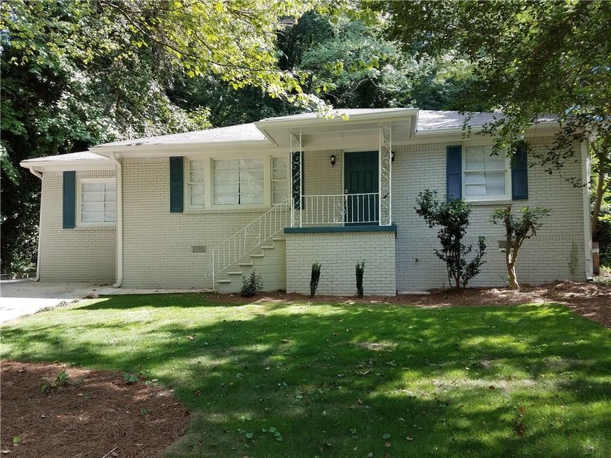Lovely curb appeal and shaded privacy in this clea