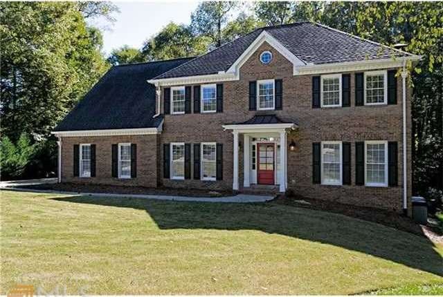 Four-sided perfectly maintained brick home. Over 4
