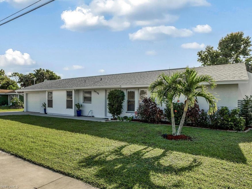 Beautiful front yard showing front of home with ov