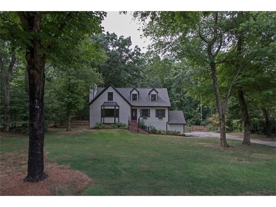 BEAUTIFUL FOUR BEDROOM HOME ON SHADED LOT