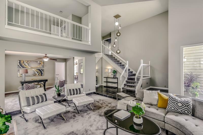 Light and bright great room off soaring 2 story fo