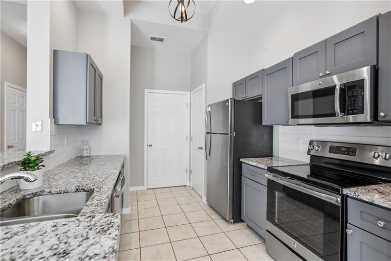Beautiful Open Kitchen with Granite Countertops