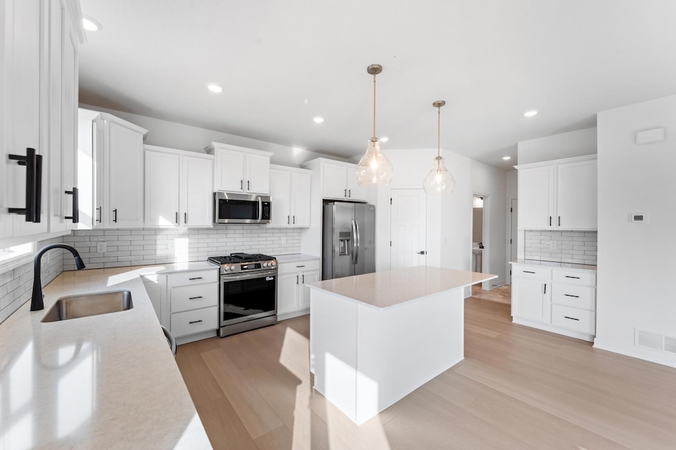 (Photo of a similar home, actual finishes may vary)