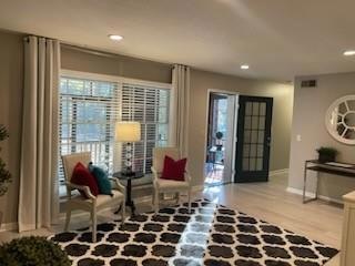 Living area with plenty of natural light and light