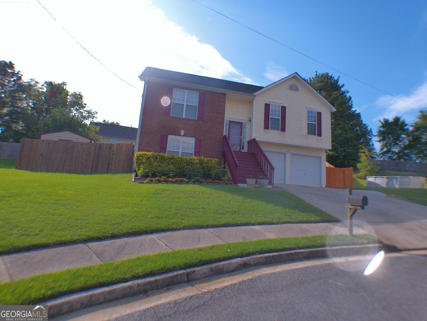 4124 Jousting Ct, Conley, GA 30288 - photo 1