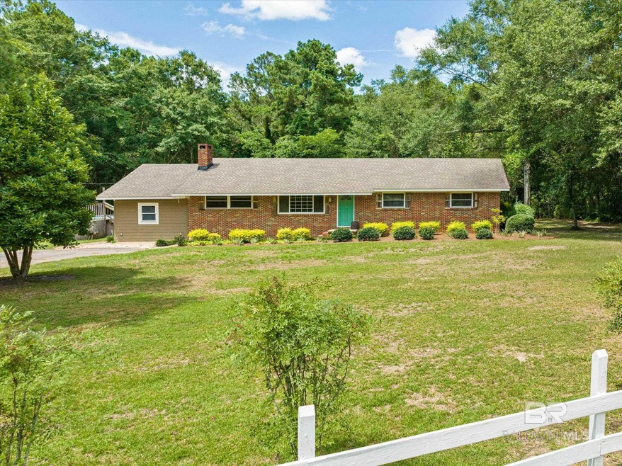Ranch-style home with a front yard