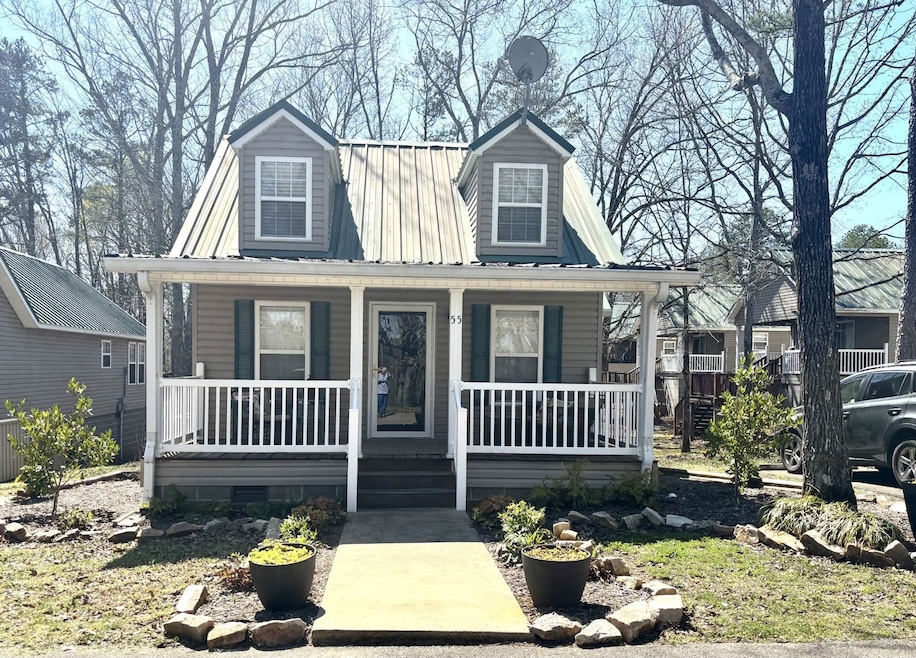 View of front of house featuring a porch, crawl sp
