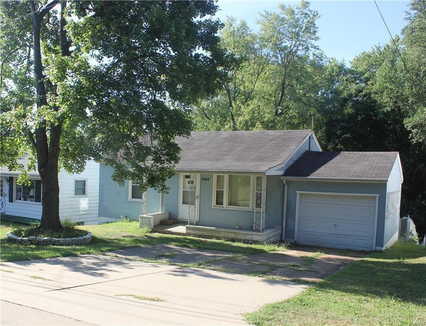 Handsome and adorable two bedroom, one bath home with a one car garage and a dynamic private back yard with a wood deck !!!!!!   Come take a look. The owner is painting the front railings and the peeling paint around the block on the front porch.  TH