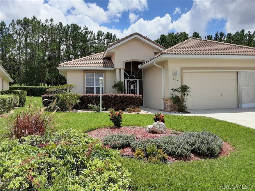 Wooded green space behind home. 2-car gar w/screen