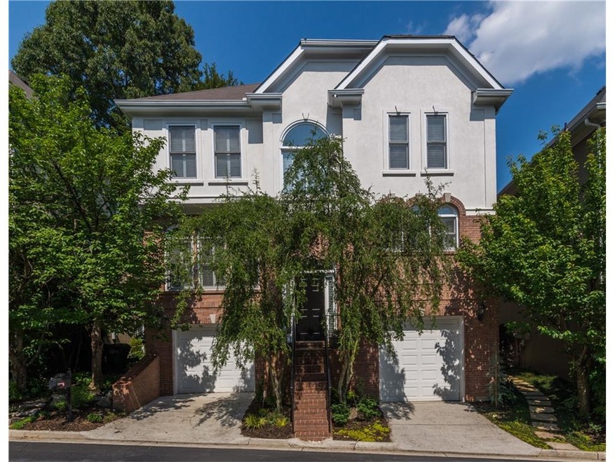 Welcoming exterior with 2 car garage.