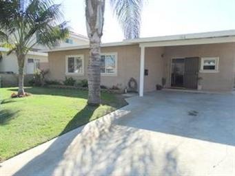 Large front yard with room for 2 cars inside the g