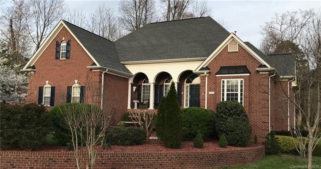 Front view of all brick 1-story basement home in Oxfordshire neighborhood!