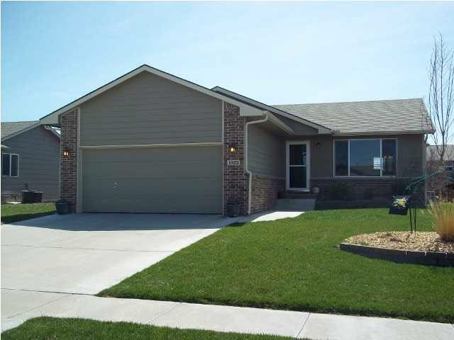 Well cared for home with sprinkler system