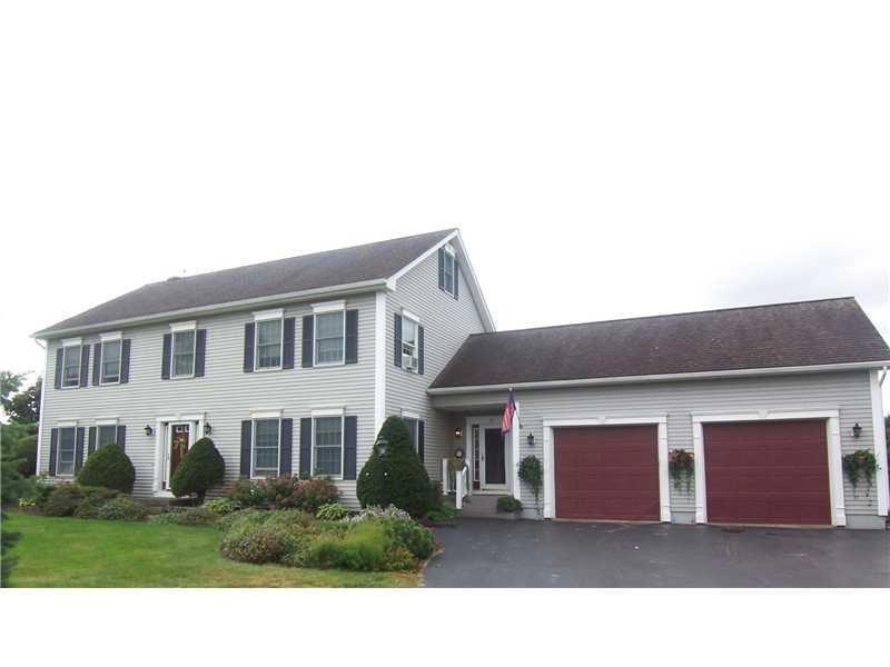 Exterior Front. Elegant colonial in...