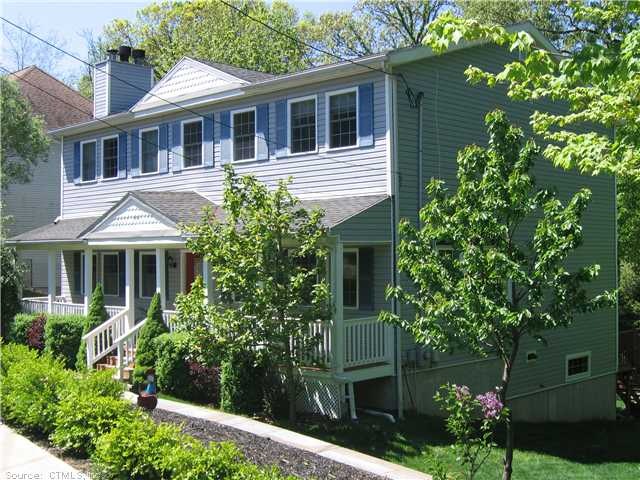 Exterior Front. Charming open porch.
