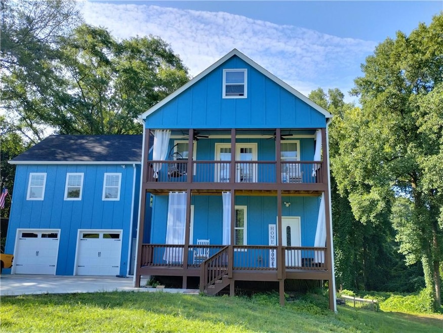 Front of property featuring board and batten sidin