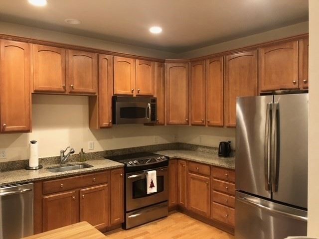 Wellington Crossing unit 308, Waltham, MA 02452 - photo 1