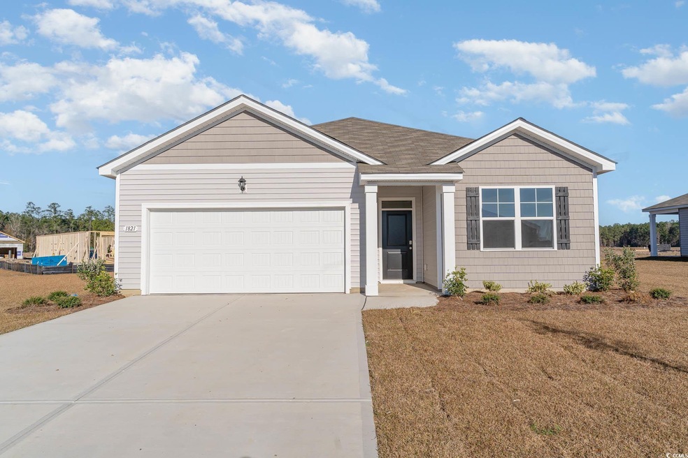 Single story home featuring driveway and an attach