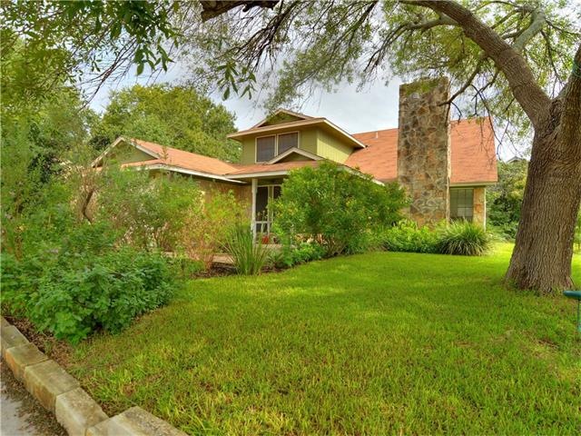Oversized corner lot with lots of landscaping for 