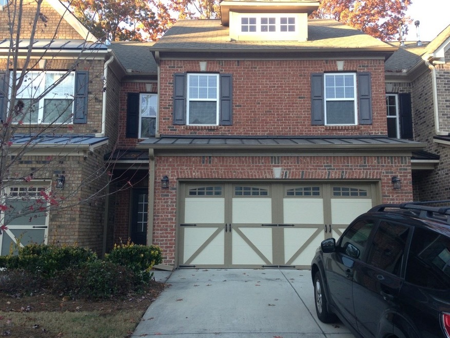 Private front entry with 2 car garage.