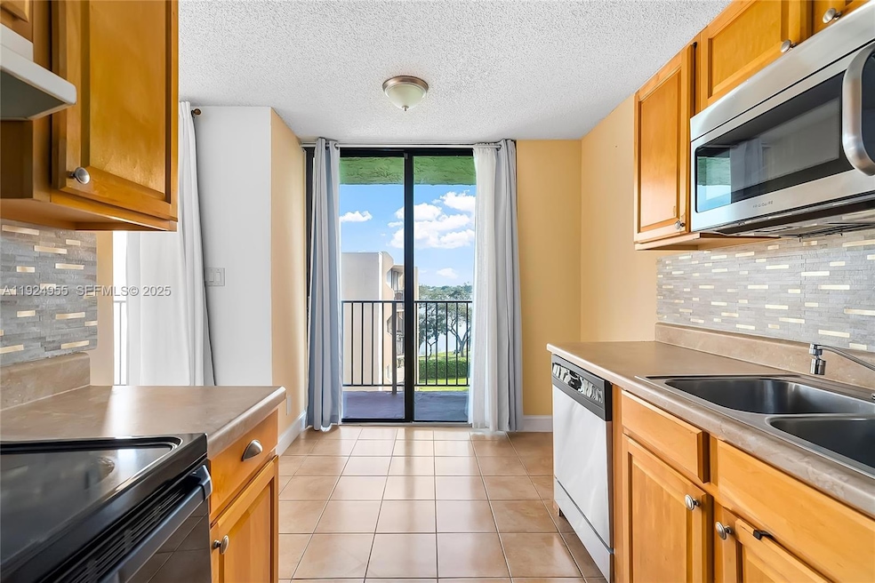 3550 Blue Lake Dr unit 502, Pompano Beach, FL 33064 - photo 1