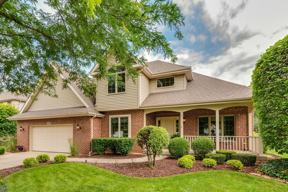 Beautiful brick front, landscaping, and front porc