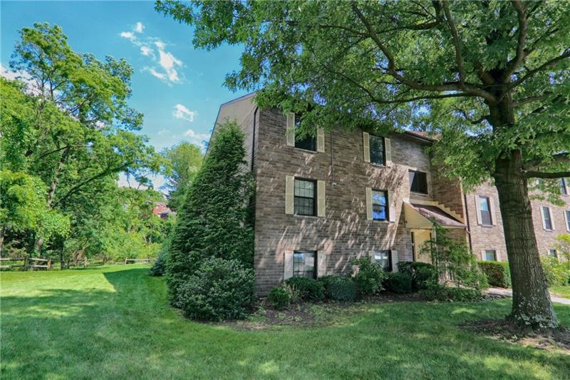 End unit in park-like quiet lot