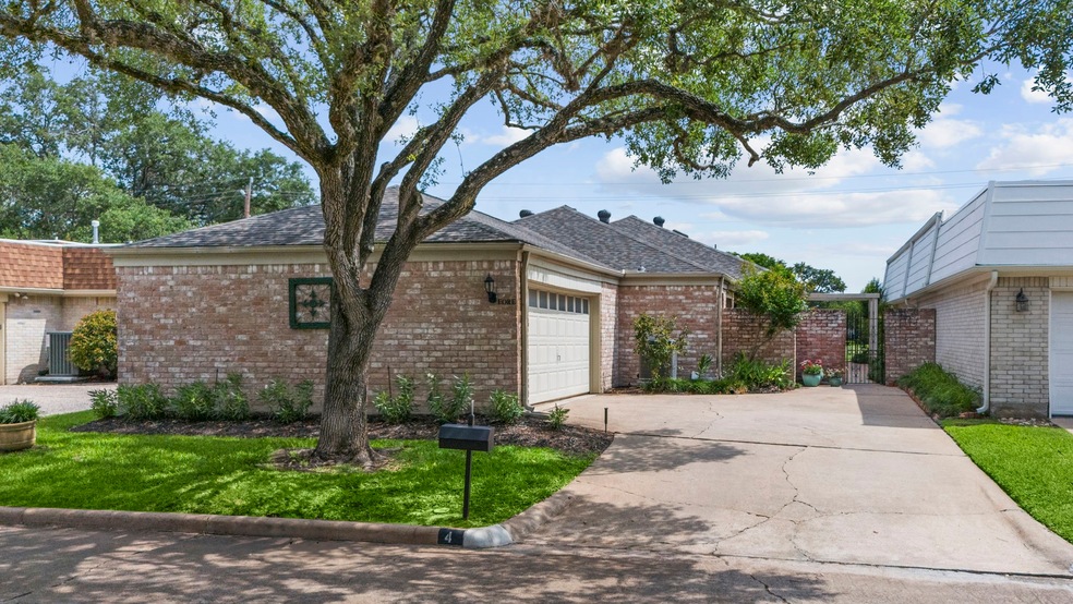Beautiful 1-story brick home located in the highly