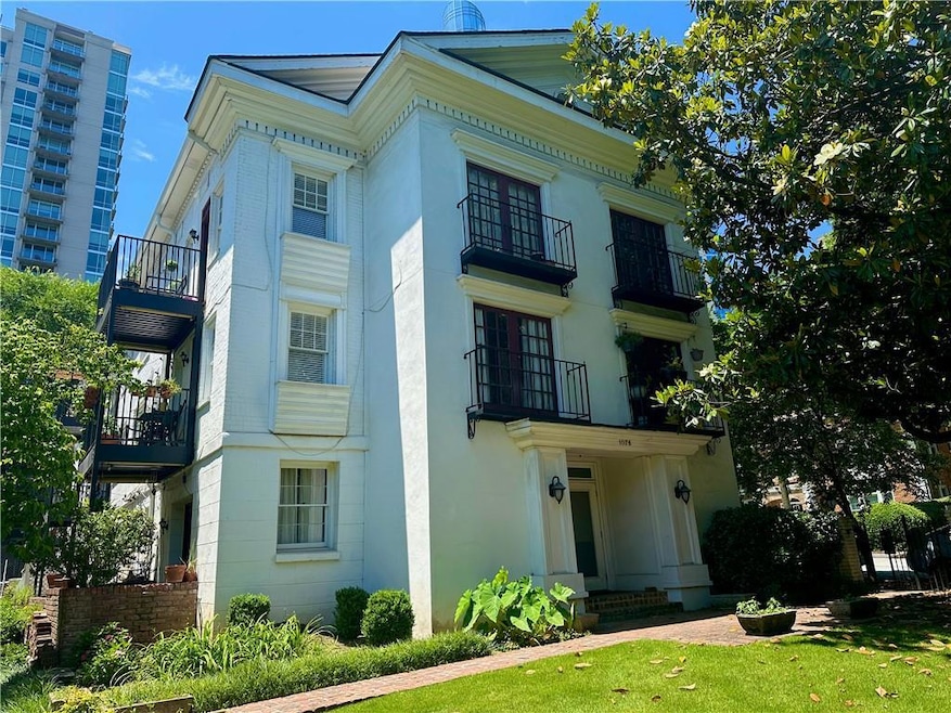 View of front facade with a balcony
