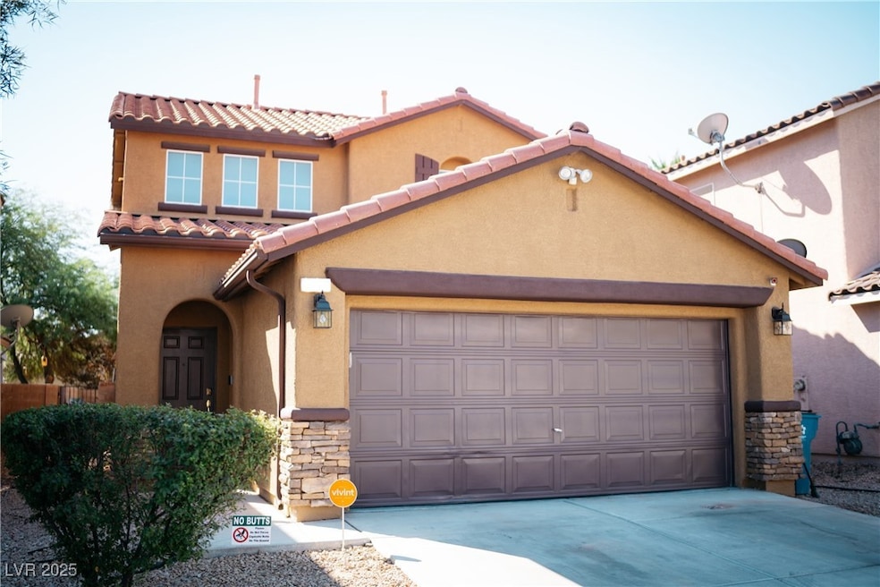 Mediterranean / spanish house with stone siding, c